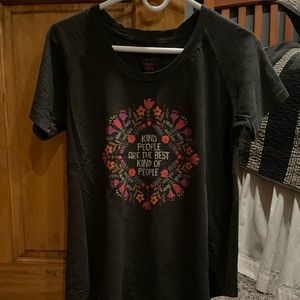 Women’s size large Naturals Tshirt. Color is dark green